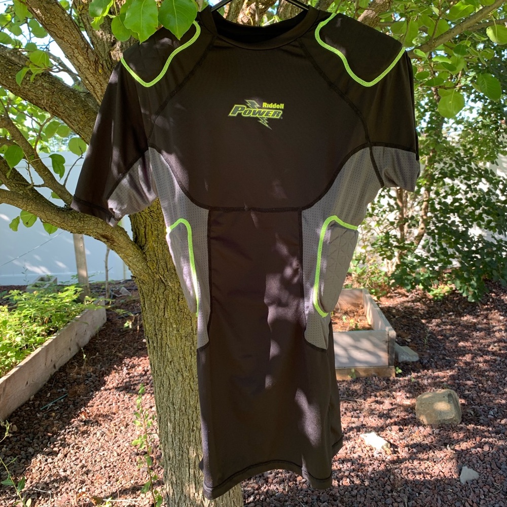 Riddle Power padded sports shirt. Adult Size L.